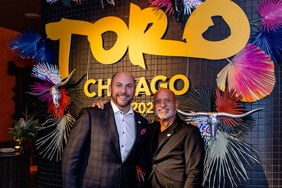 Wayne (right) with Nick OrRico, General Manager of the Fairmont Chicago, at the TORO Opening Party in November 2024.