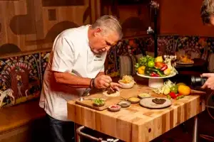 Chef prepares food for the opening party of TORO in The Fairmont Chicago